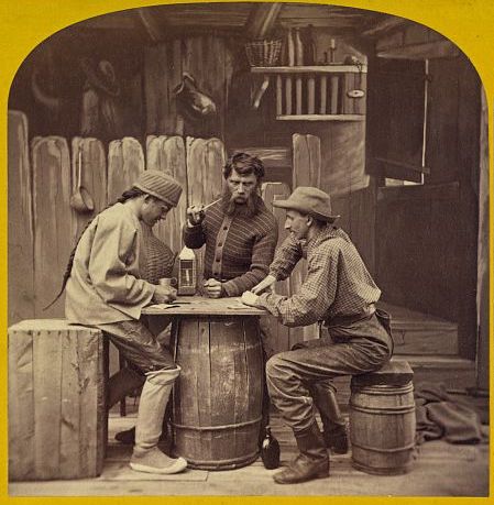 Photograph depicts a line from the poem Plain Language from Truthful James by Francis Bret Harte, 1870, showing Truthful James, Bill Nye, and Ah Sin sitting on boxes and barrels, cheating in a game of Euchre.