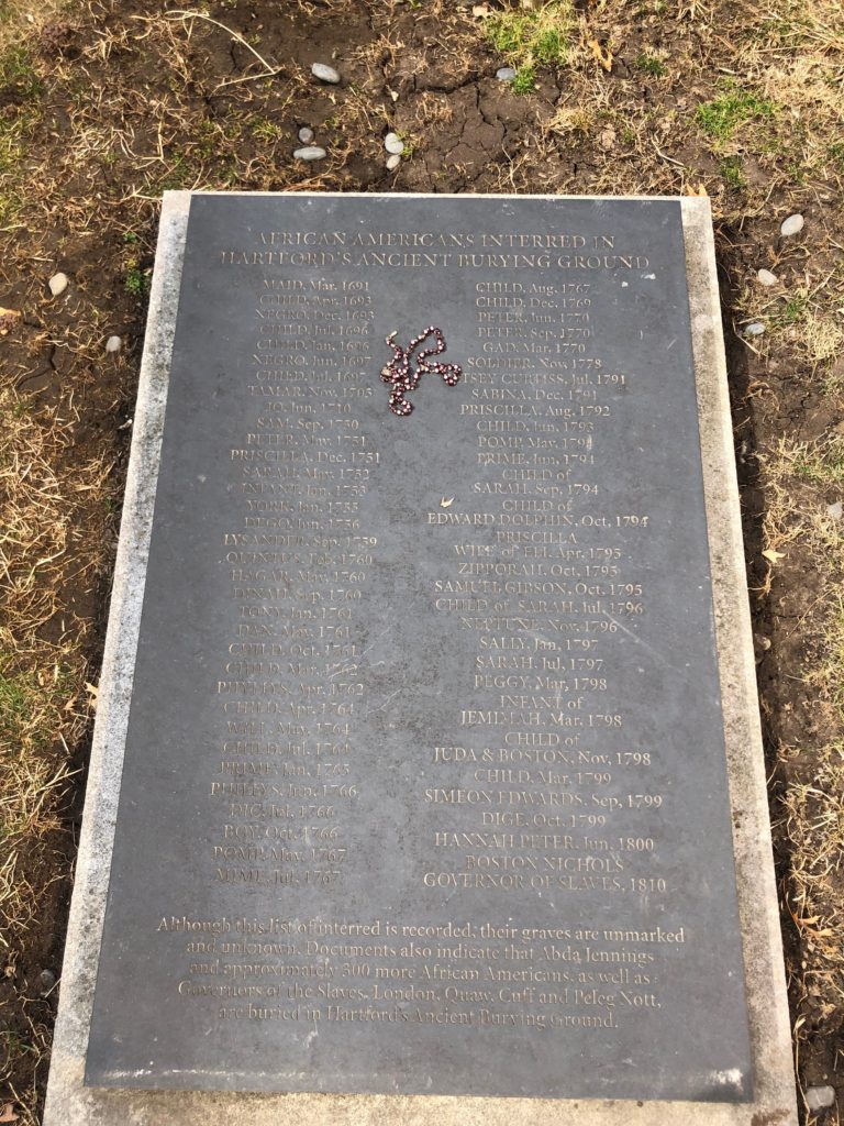 Modern-day memorial, in Puritan style, listing the names or occupations of some of the three hundred African Americans buried in the churchyard