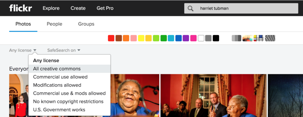 Flickr search results page. The "Any license" drop-down menu is open.