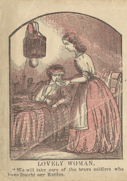 Civil War envelope showing woman nursing soldier with message "Lovely woman. We will take care of the brave soldiers who have fought our battles"